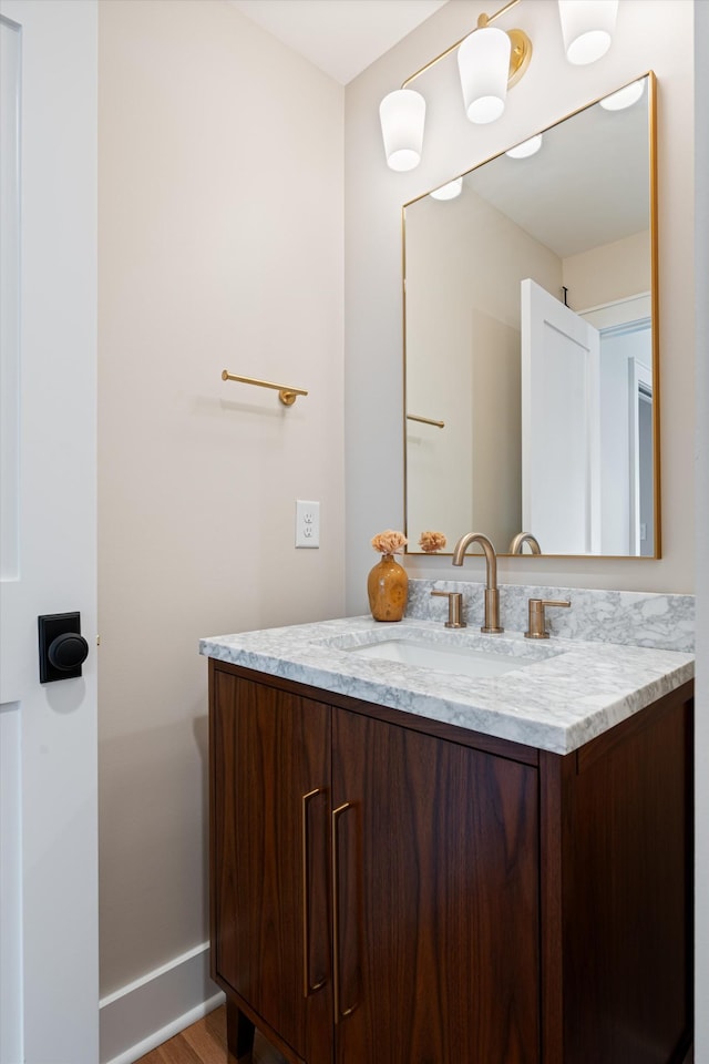 1908 Beechwood Ave, Nashville, TN 37212 - bathroom with wood finished floors, vanity, and baseboards