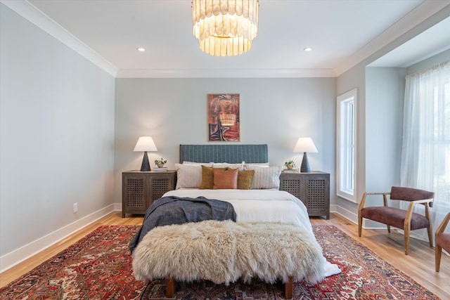 1908 Beechwood Ave, Nashville, TN 37212 - bedroom featuring baseboards, crown molding, a chandelier, light wood-style flooring, and recessed lighting