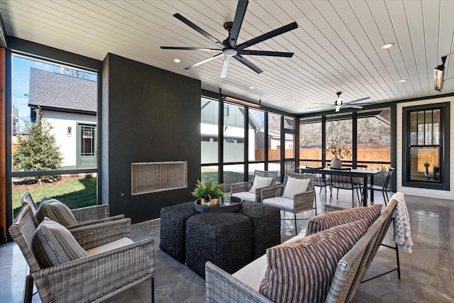 1908 Beechwood Ave, Nashville, TN 37212 - sunroom / solarium featuring an outdoor hangout area, ceiling fan, and healthy amount of natural light