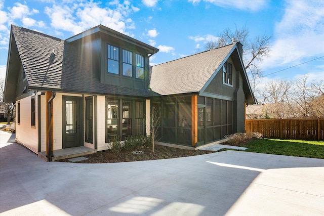 1908 Beechwood Ave, Nashville, TN 37212 - back of property with a sunroom, roof with shingles, and fence