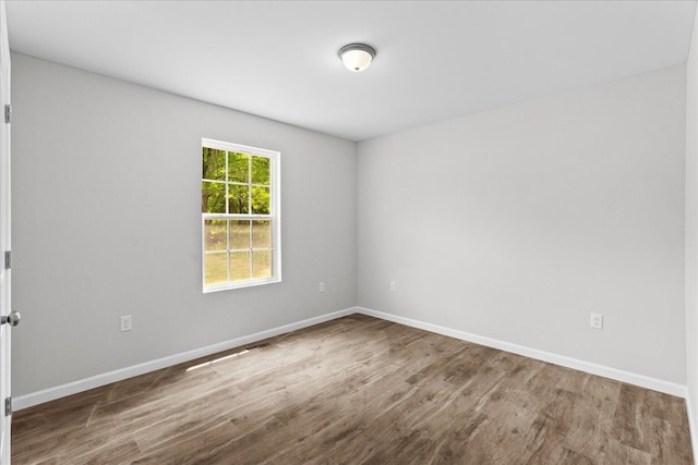 674 Eber Rd, Dalton, GA 30720 - unfurnished room featuring wood finished floors and baseboards