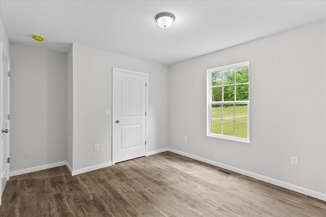674 Eber Rd, Dalton, GA 30720 - empty room featuring wood finished floors and baseboards