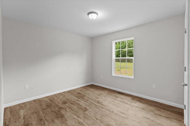674 Eber Rd, Dalton, GA 30720 - spare room with baseboards and wood finished floors