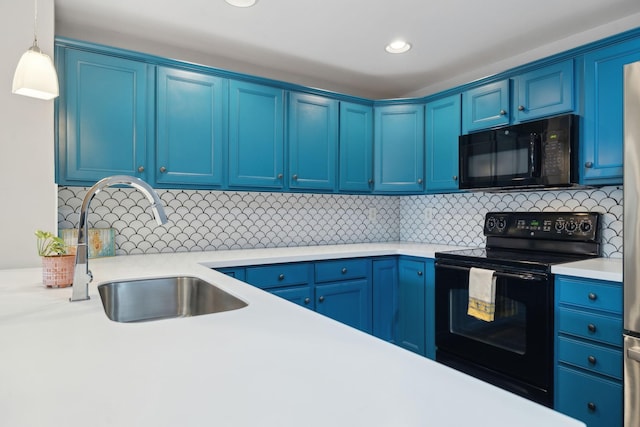 3201 Aspen Grove Dr Unit F4, Franklin, TN 37067 - kitchen with black appliances, a sink, light countertops, decorative backsplash, and blue cabinets