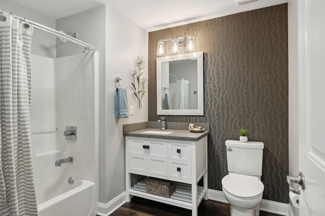 3201 Aspen Grove Dr Unit F4, Franklin, TN 37067 - full bathroom featuring wood finished floors, baseboards, shower / tub combo with curtain, toilet, and vanity