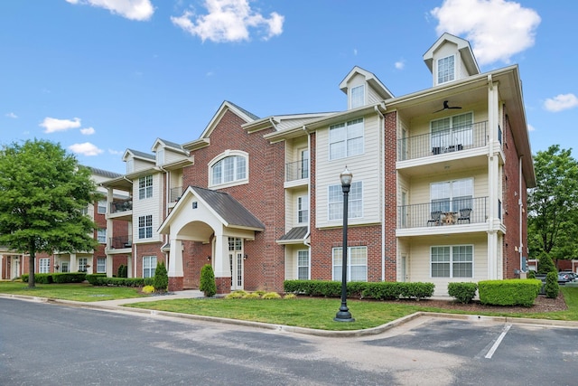 3201 Aspen Grove Dr Unit F4, Franklin, TN 37067 - view of building exterior featuring uncovered parking