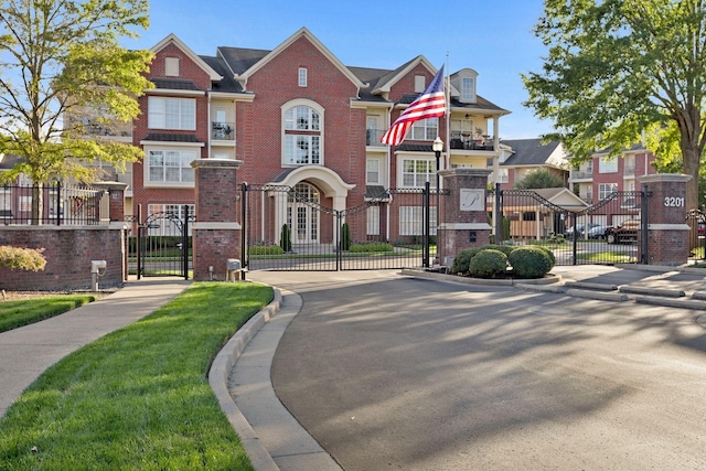 3201 Aspen Grove Dr Unit F4, Franklin, TN 37067 - multi unit property with a gate, fence, brick siding, and a residential view