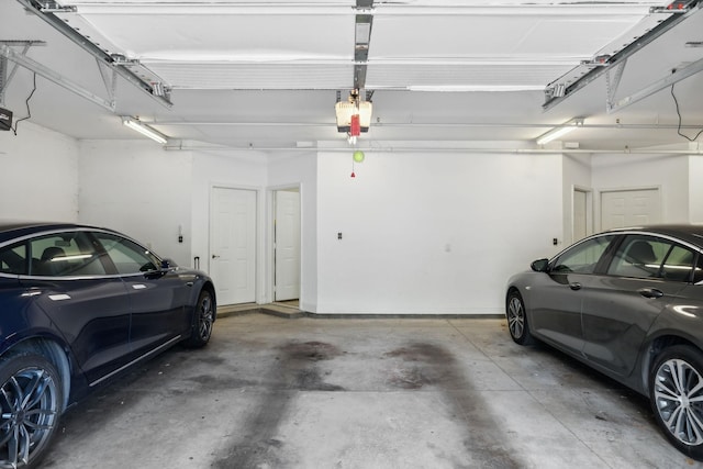 3201 Aspen Grove Dr Unit F4, Franklin, TN 37067 - parking deck featuring a garage door opener