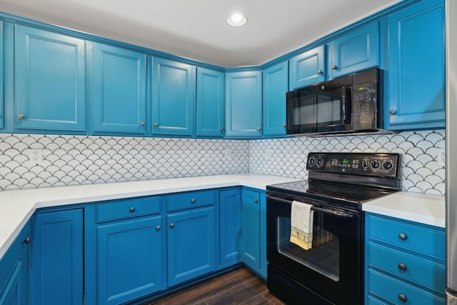 3201 Aspen Grove Dr Unit F4, Franklin, TN 37067 - kitchen featuring black appliances, blue cabinets, light countertops, decorative backsplash, and dark wood-type flooring