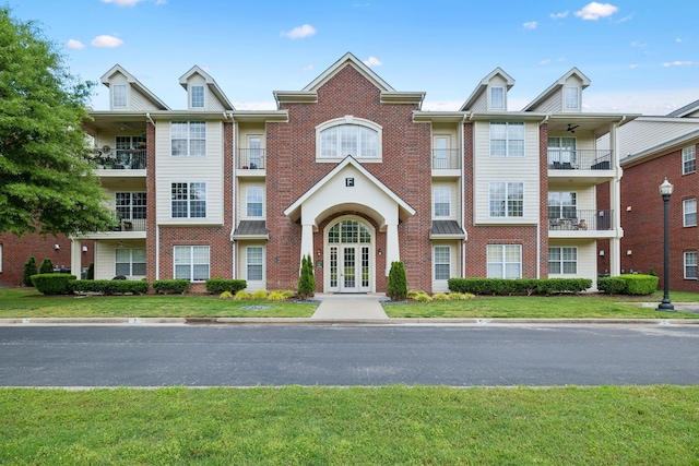 3201 Aspen Grove Dr Unit F4, Franklin, TN 37067 - view of front facade with french doors and brick siding