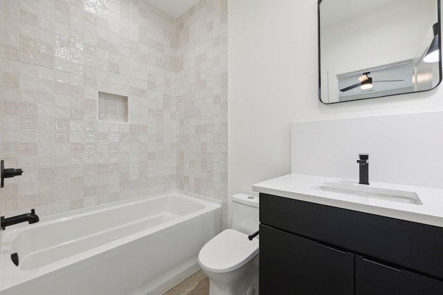 full bathroom featuring toilet, vanity, and  shower combination
