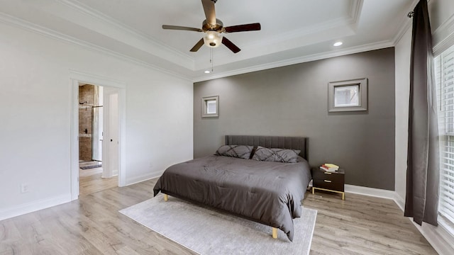 788 Jersey Dr, Clarksville, TN 37043 - bedroom featuring a tray ceiling, light wood-style floors, ornamental molding, multiple windows, and recessed lighting