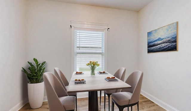 788 Jersey Dr, Clarksville, TN 37043 - dining space featuring baseboards and light wood-style flooring