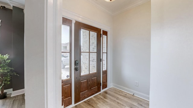 788 Jersey Dr, Clarksville, TN 37043 - foyer featuring light wood-type flooring, ornamental molding, and baseboards
