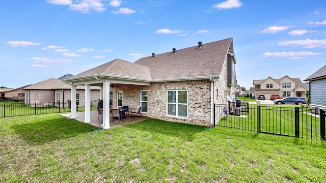 788 Jersey Dr, Clarksville, TN 37043 - rear view of house featuring brick siding, roof with shingles, and a patio area