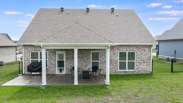 788 Jersey Dr, Clarksville, TN 37043 - back of property featuring a patio area, brick siding, roof with shingles, and central air condition unit