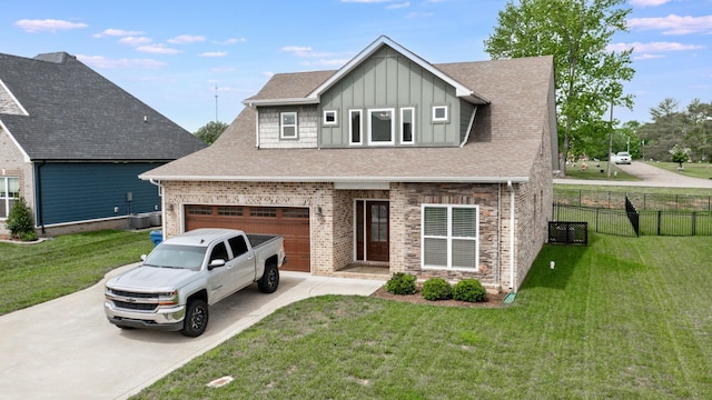 788 Jersey Dr, Clarksville, TN 37043 - view of front of home featuring board and batten siding, concrete driveway, a shingled roof, and brick siding
