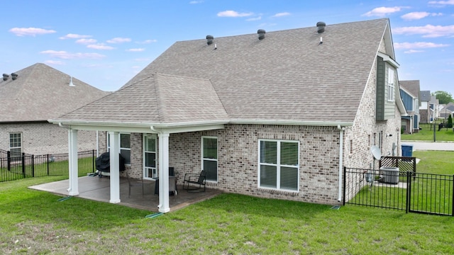 788 Jersey Dr, Clarksville, TN 37043 - rear view of property featuring brick siding, roof with shingles, and a patio