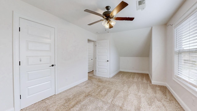788 Jersey Dr, Clarksville, TN 37043 - additional living space with carpet, healthy amount of natural light, a ceiling fan, baseboards, and lofted ceiling