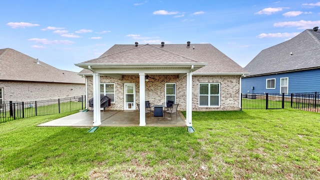 788 Jersey Dr, Clarksville, TN 37043 - back of property with brick siding, a patio area, and a shingled roof