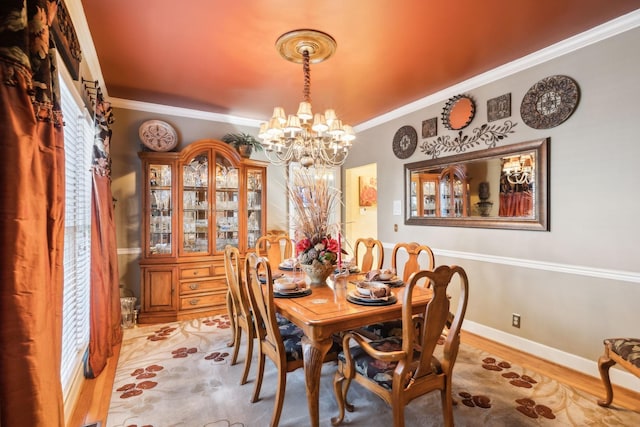 1001 Williams Way, Old Hickory, TN 37138 - dining area featuring a chandelier, ornamental molding, wood finished floors, and baseboards