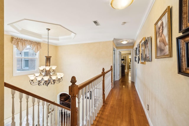 1001 Williams Way, Old Hickory, TN 37138 - hall featuring wood finished floors, crown molding, a chandelier, an upstairs landing, and a raised ceiling