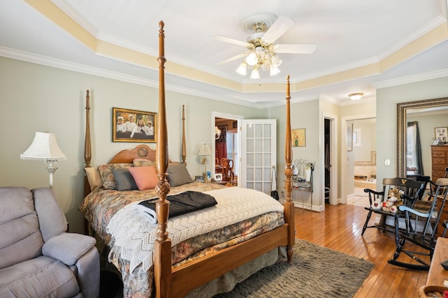 1001 Williams Way, Old Hickory, TN 37138 - bedroom with a tray ceiling, light wood-type flooring, crown molding, baseboards, and a ceiling fan