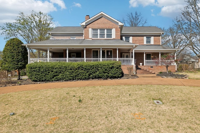 1001 Williams Way, Old Hickory, TN 37138 - view of front of home featuring brick siding, covered porch, a front lawn, and a chimney