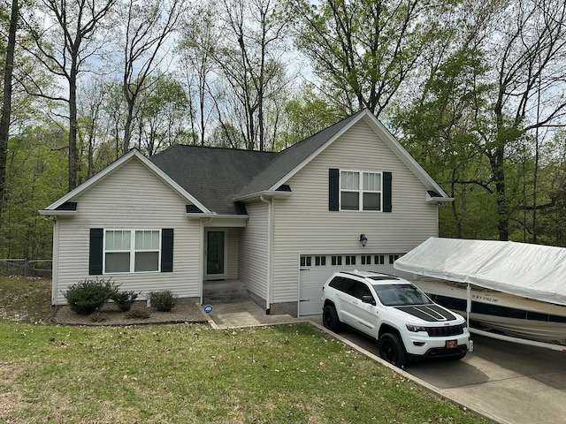7296 Sugar Camp Dr, Greenbrier, TN 37073 - traditional-style house featuring concrete driveway, an attached garage, and a front lawn