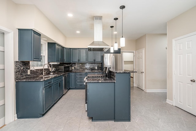 kitchen with island exhaust hood, a sink, appliances with stainless steel finishes, dark stone counters, and recessed lighting