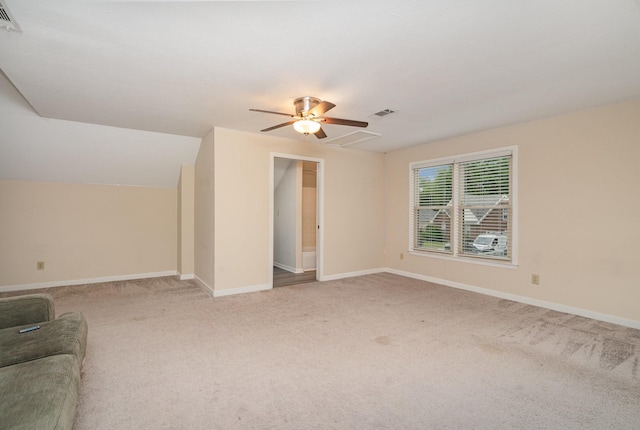 unfurnished living room with carpet, ceiling fan, and baseboards