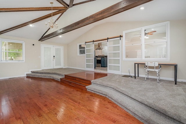 unfurnished living room with a chandelier, baseboards, wood finished floors, ceiling fan, and recessed lighting