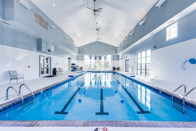 indoor pool featuring a ceiling fan