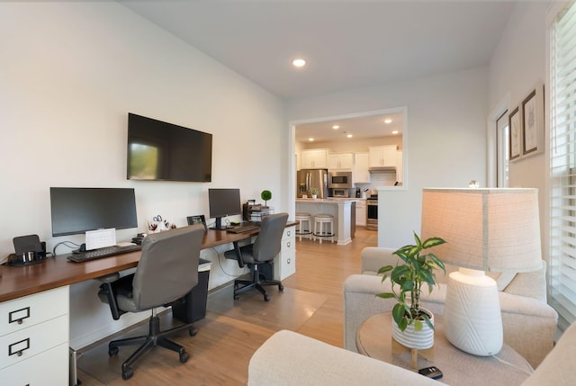 office featuring light wood finished floors and recessed lighting