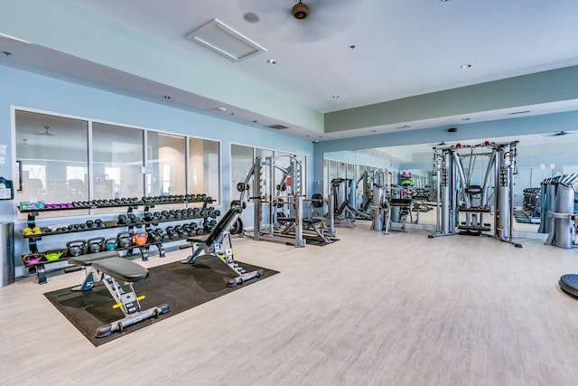 gym featuring wood finished floors and recessed lighting