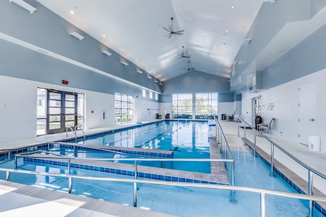 indoor community pool featuring a ceiling fan and french doors