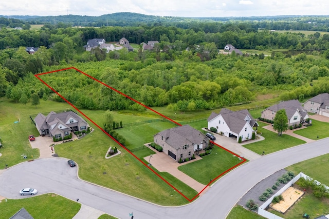144 Autumn Crk, Lebanon, TN 37087 - aerial view of residential area with property parcel outlined and a heavily wooded area