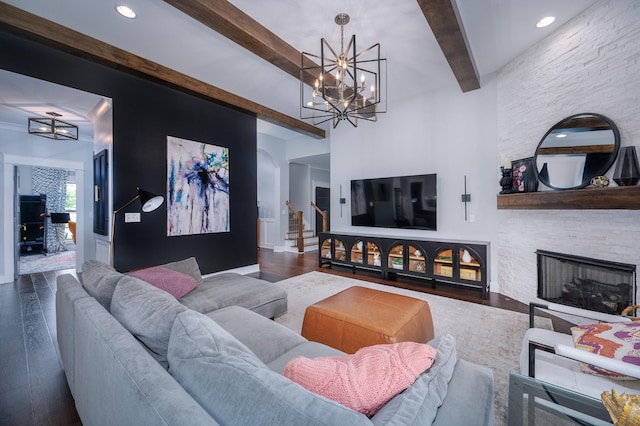 144 Autumn Crk, Lebanon, TN 37087 - living area featuring a chandelier, beam ceiling, wood finished floors, a stone fireplace, and recessed lighting