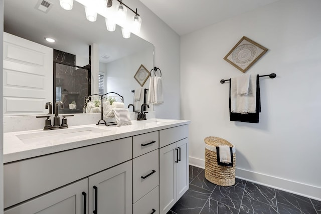 503 Mantes Aly, Hendersonville, TN 37075 - bathroom featuring a stall shower, double vanity, marble finish floors, and baseboards
