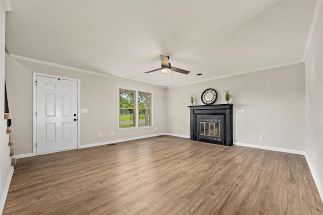 1643 Windy Meadow Dr, Christiana, TN 37037 - unfurnished living room with a ceiling fan, a glass covered fireplace, wood finished floors, baseboards, and ornamental molding