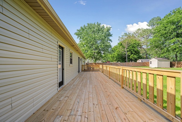1643 Windy Meadow Dr, Christiana, TN 37037 - wooden terrace featuring a storage shed, an outdoor structure, and fence