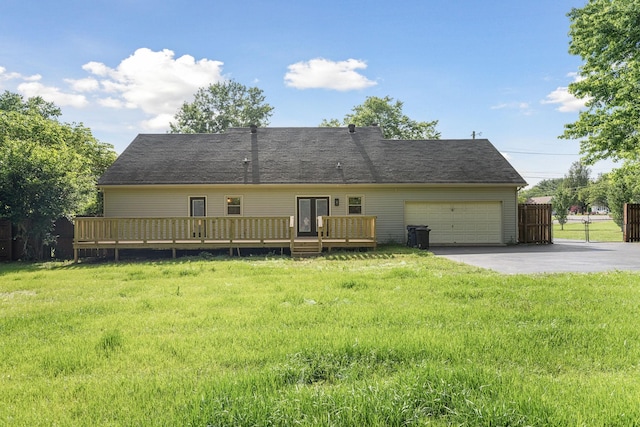 1643 Windy Meadow Dr, Christiana, TN 37037 - rear view of property with asphalt driveway, a garage, and a wooden deck