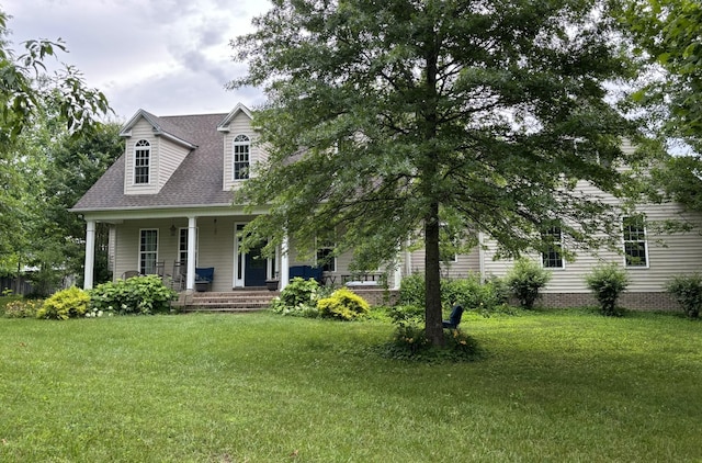 204 Revilo Rd, Leoma, TN 38468 - cape cod house with a front yard, covered porch, and roof with shingles