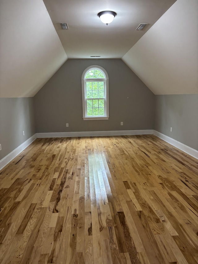 204 Revilo Rd, Leoma, TN 38468 - additional living space featuring hardwood / wood-style flooring, lofted ceiling, and baseboards