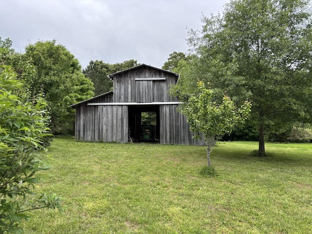 204 Revilo Rd, Leoma, TN 38468 - view of grassy yard with an outbuilding and a barn