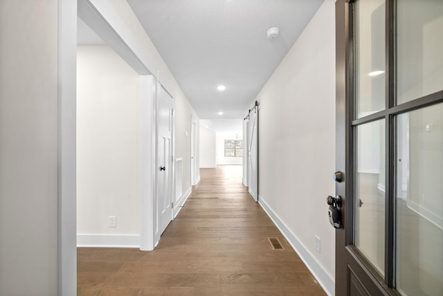 1936 Flats Rd, Cunningham, TN 37052 - corridor featuring wood finished floors, recessed lighting, and baseboards