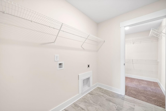 1936 Flats Rd, Cunningham, TN 37052 - laundry area with hookup for an electric dryer, baseboards, and hookup for a washing machine