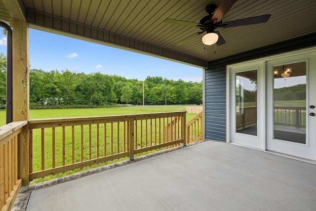 1936 Flats Rd, Cunningham, TN 37052 - view of patio featuring ceiling fan and a view of trees