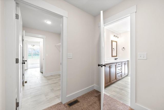 1936 Flats Rd, Cunningham, TN 37052 - hall featuring a sink and baseboards