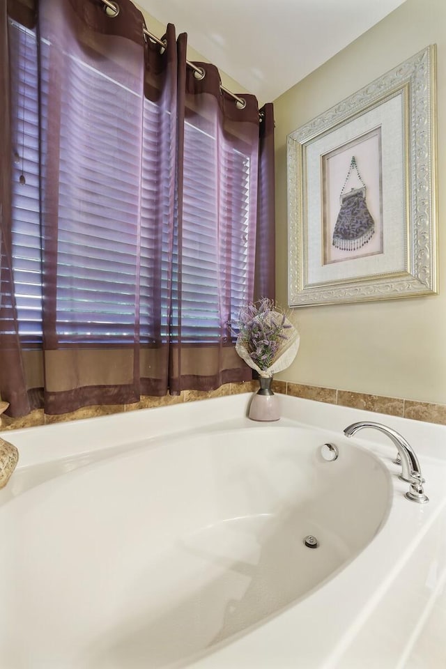 bathroom featuring a bath